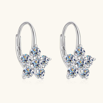 Elegant 1.2 Carat 925 Sterling Silver Moissanite Flower Huggie Earrings with sparkling crystals, showcasing a stylish star-shaped design.