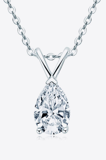 Elegant Moissanite Pear-Cut Pendant on Silver Chain - A dazzling 1.5 carat moissanite stone set in a sterling silver necklace, showcasing the gemstone's brilliant sparkle and luxurious style.