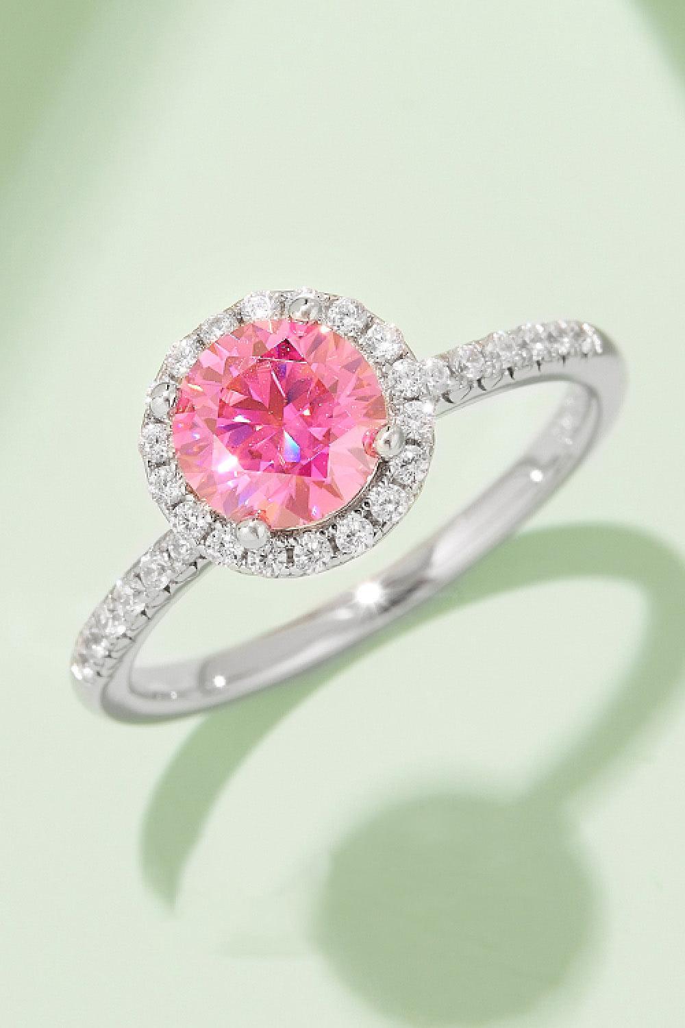 Elegant sterling silver ring with sparkling 1-carat pink moissanite gemstone and diamond halo