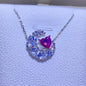 Elegant 1 Carat Moissanite 925 Sterling Silver Heart Necklace with sparkling gemstones in a crescent moon pendant design.