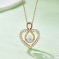 Elegant heart-shaped pendant necklace with 1 carat moissanite center stone and sterling silver gold-tone chain