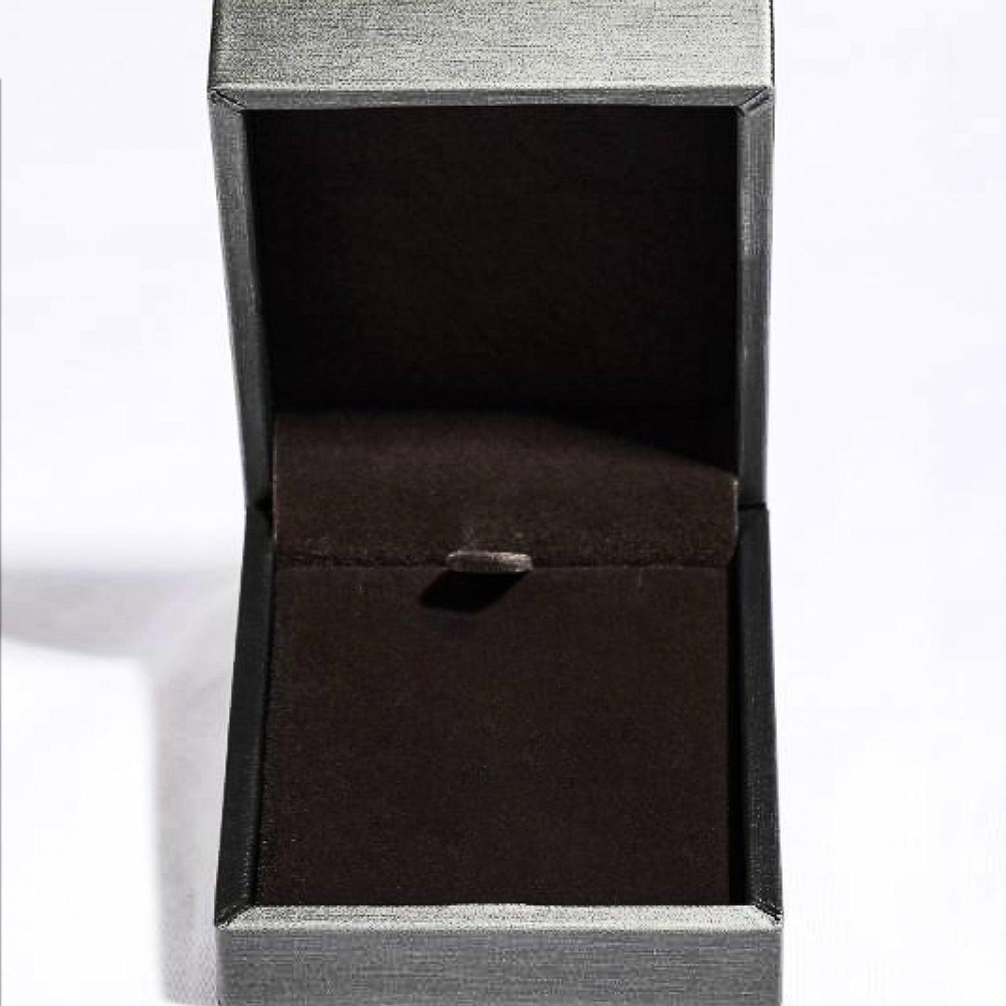 Elegant gray jewelry box with black interior, showcasing a minimalist and sophisticated design.