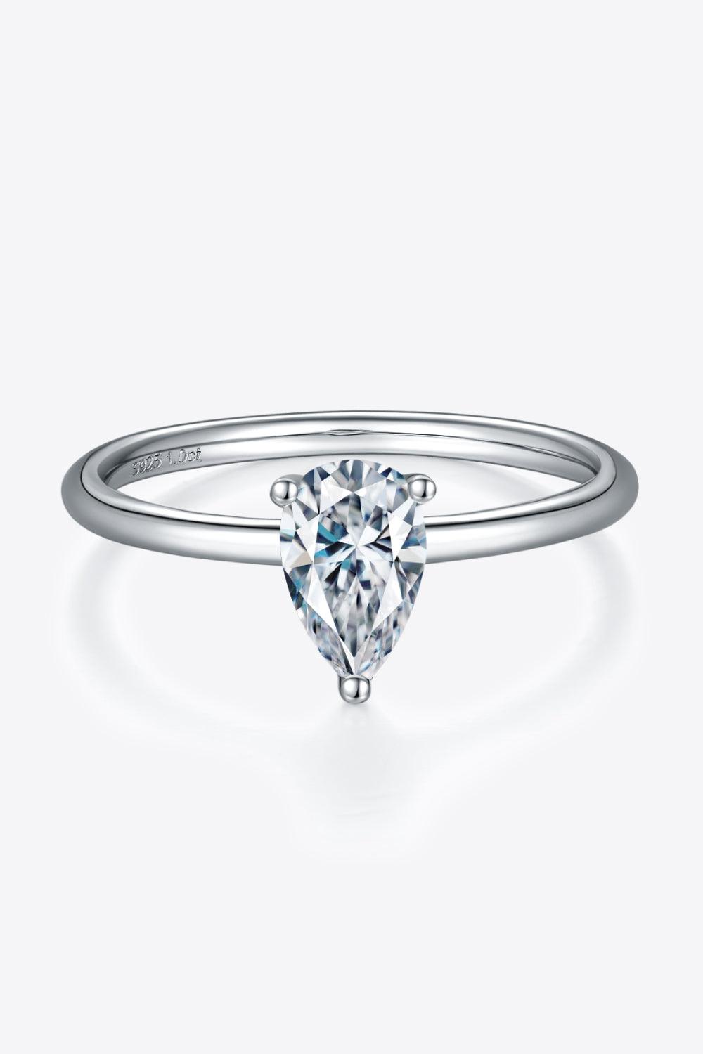 1 carat pear-shaped moissanite center stone ring set in sterling silver