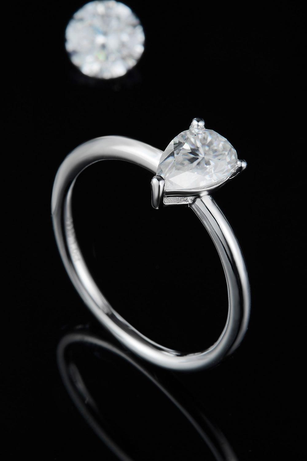 Stunning 1 carat moissanite solitaire ring with pear-shaped stone set in sleek sterling silver band