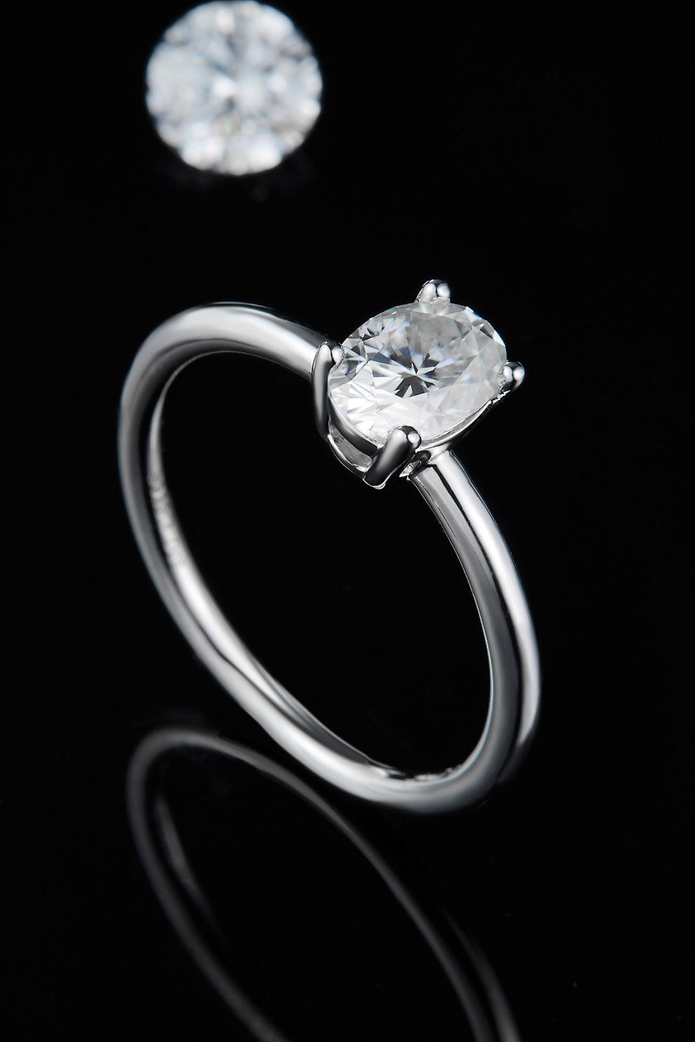 Elegant 1 Carat Moissanite Sterling Silver Solitaire Ring on Black Background