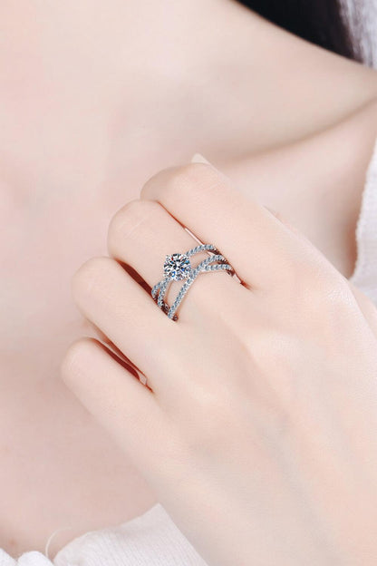 Elegant Moissanite Crisscross Ring on Delicate Female Hand