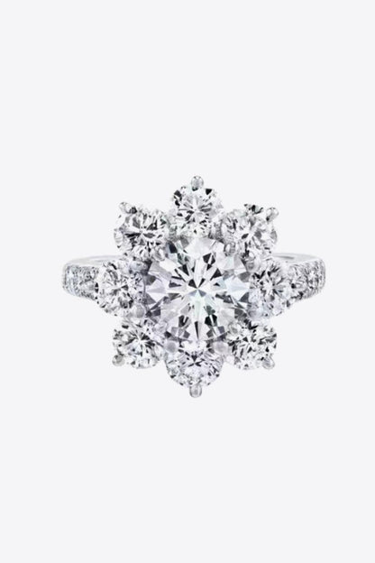 Exquisite Moissanite Floral Ring - Dazzling diamond-like stones arranged in a beautiful floral design, showcasing a stunning center stone.