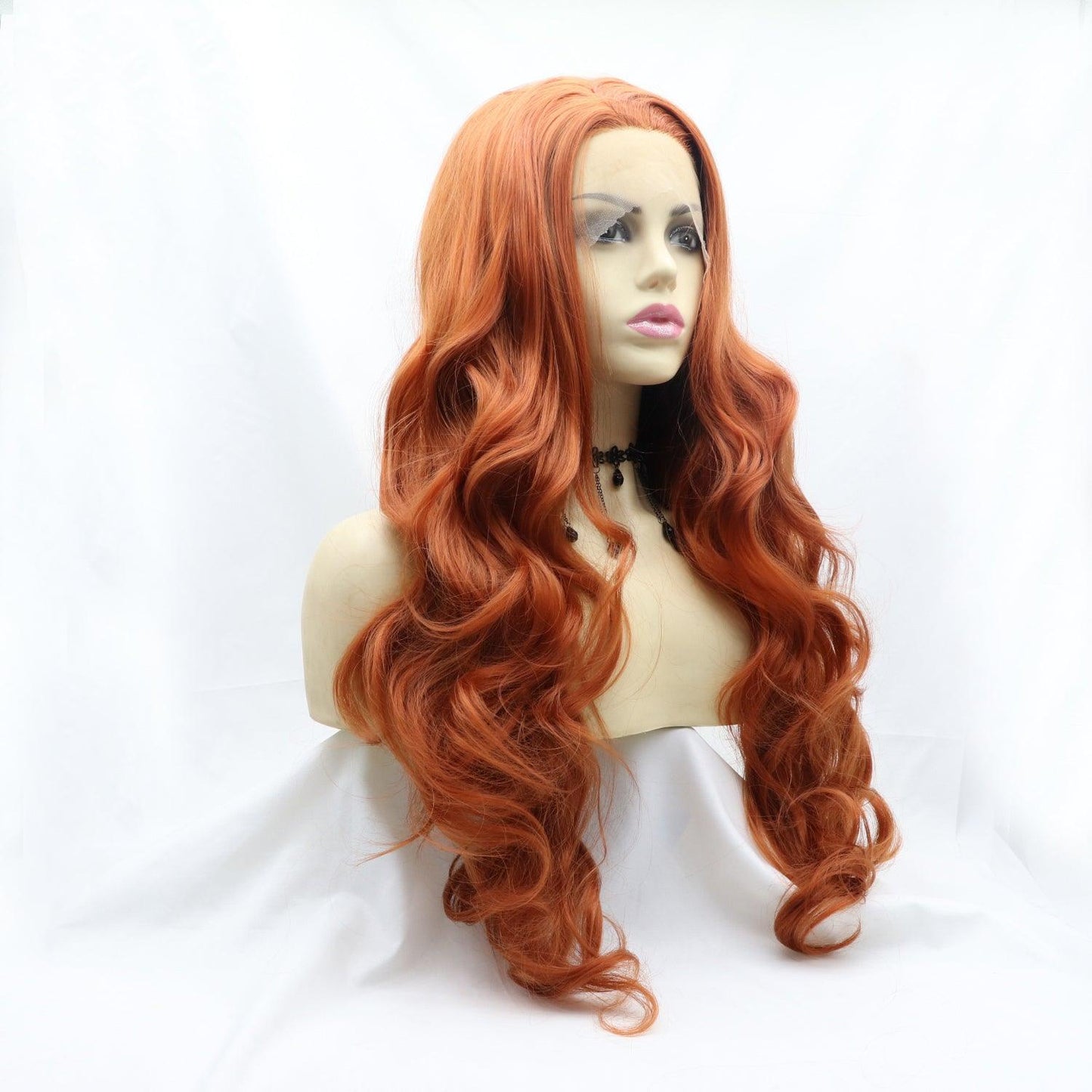 Vibrant orange wavy wig with long, luxurious curls and 130% density for a full, natural appearance.