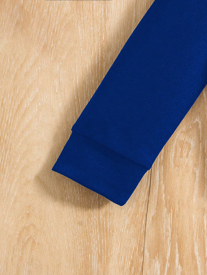 a blue tie laying on top of a wooden floor