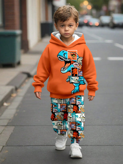 a young boy walking down a street wearing a dinosaur print pants