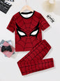 a spider man shirt and pants are on a table