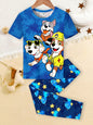 a boy's blue shirt with cartoon dogs on it