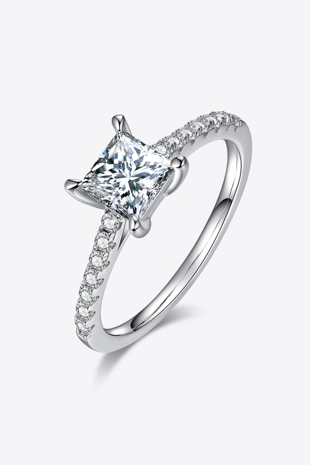 Elegant sterling silver ring with a princess-cut moissanite center stone and pave-set side stones