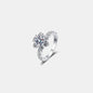 Elegant 1 carat moissanite solitaire ring with intricate sterling silver floral design