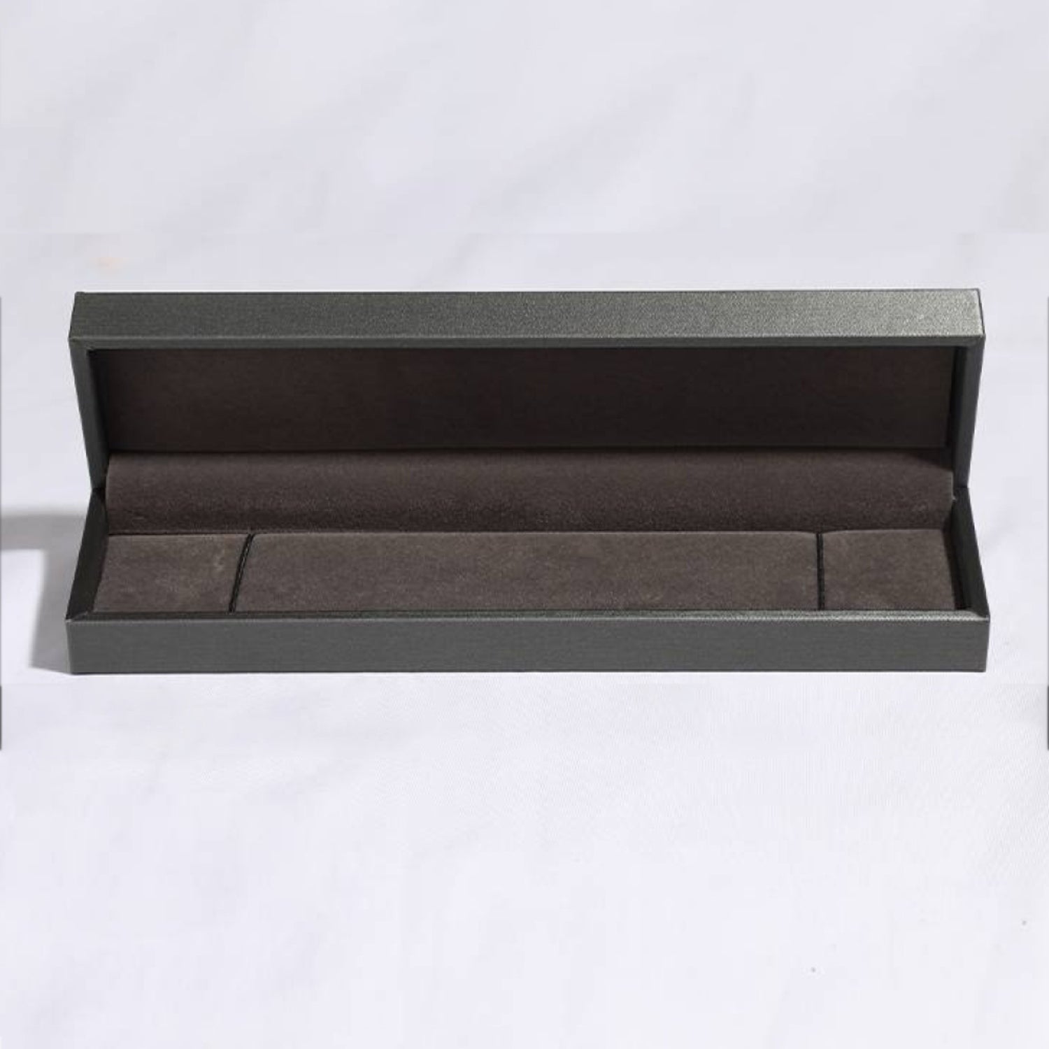 a black box with two compartments on a white background