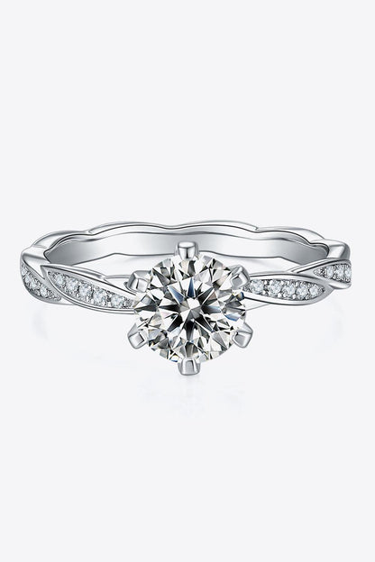 Elegant 1 carat moissanite engagement ring in 925 sterling silver with pave diamond accents.