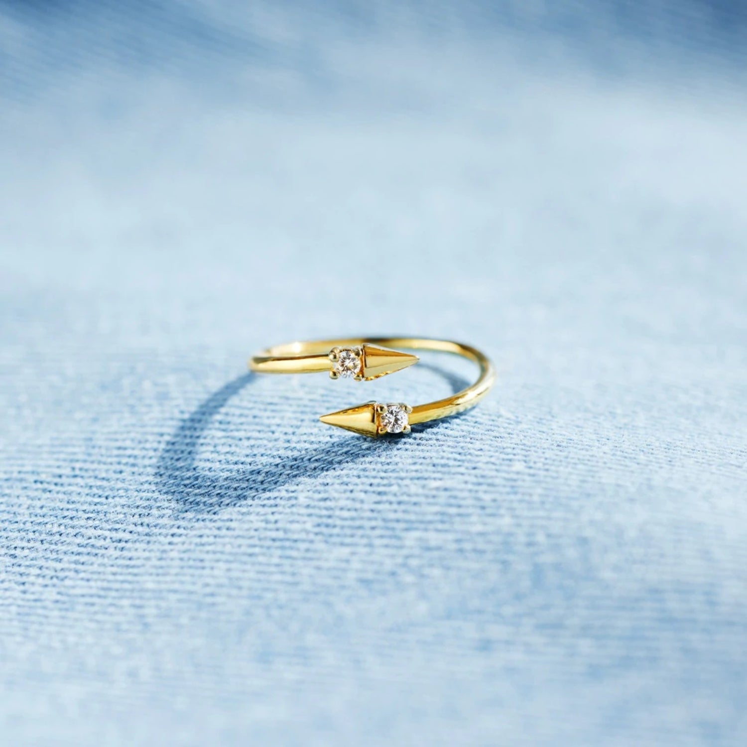 a close up of a ring on a blue surface