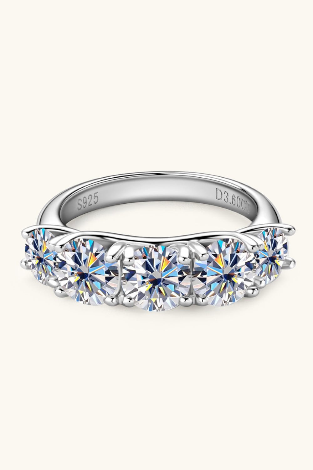 1 Carat Moissanite 925 Sterling Silver Half-Eternity Ring with sparkling gemstones in a sleek, modern design.