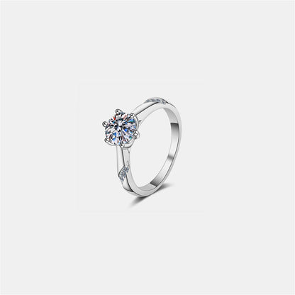 Elegant 1 Carat Moissanite 925 Sterling Silver Ring with a brilliant cut stone set in a shiny silver band.