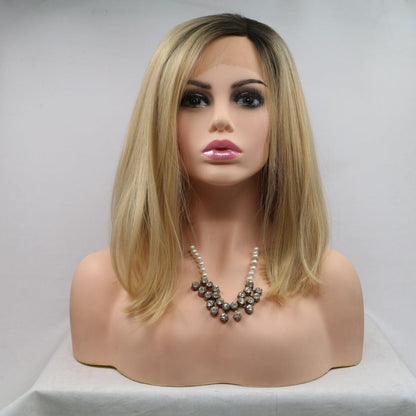 Fashionable mid-length blonde wig with chic crystal necklace displayed on a mannequin head.