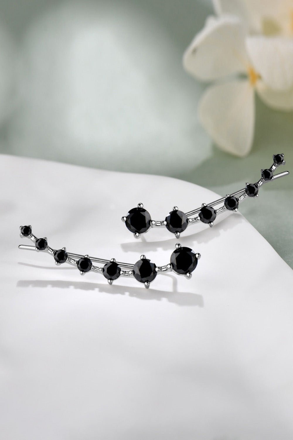 Elegant 1.9 Carat Moissanite 925 Sterling Silver Earrings with Black Gemstones on White Backdrop