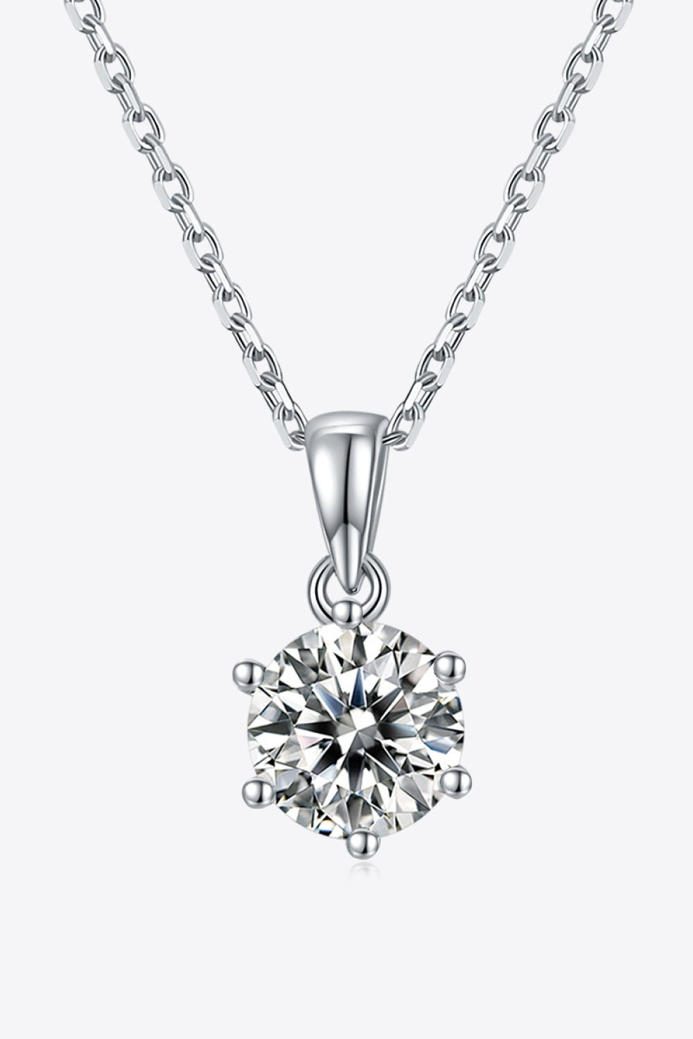 Sparkling Sterling Silver Moissanite Pendant Necklace - Elegant sterling silver chain showcasing a captivating moissanite gemstone center, radiating brilliance and sophistication.