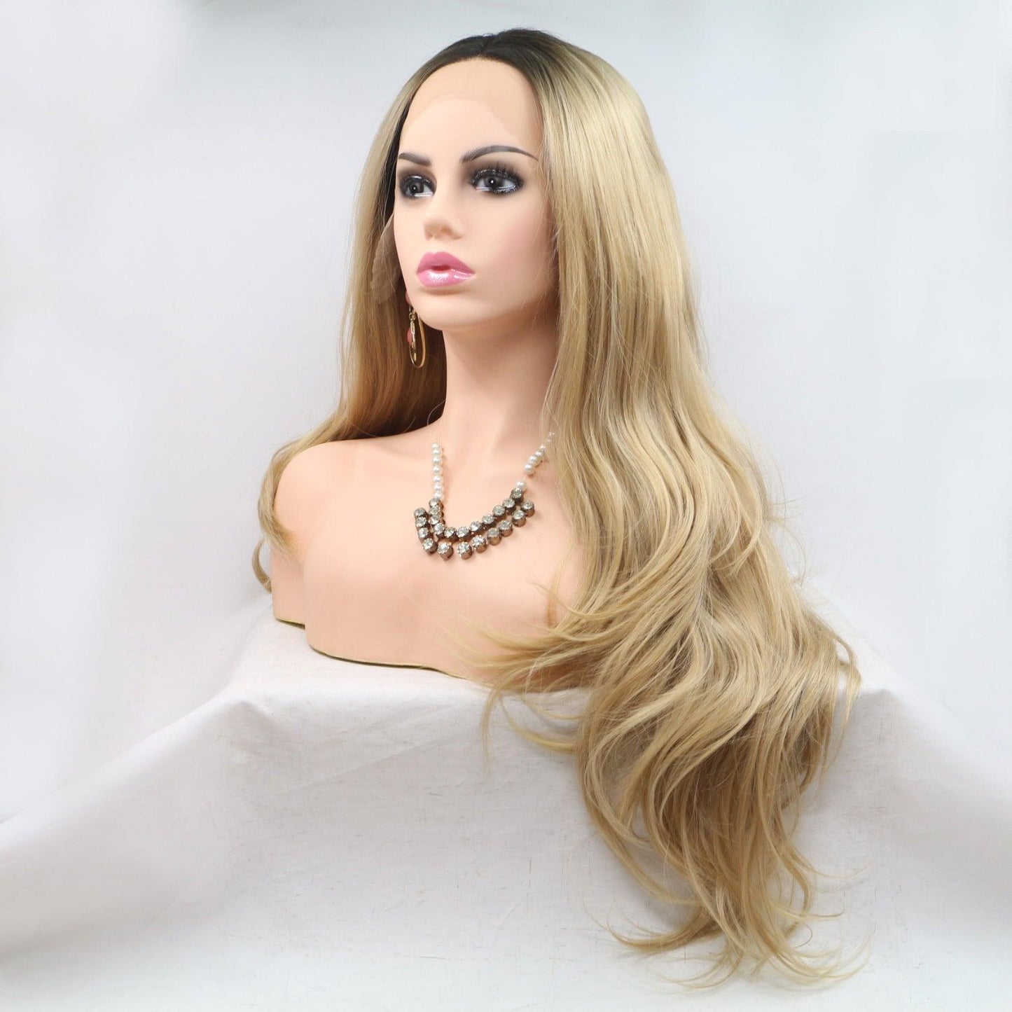 Blonde wavy wig with 130% density and 24-inch length displayed on a mannequin head against a white background