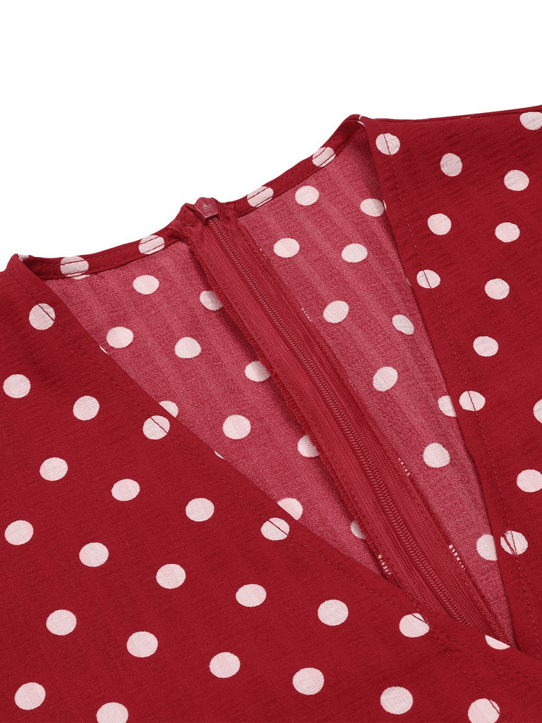 a close up of a red and white polka dot shirt