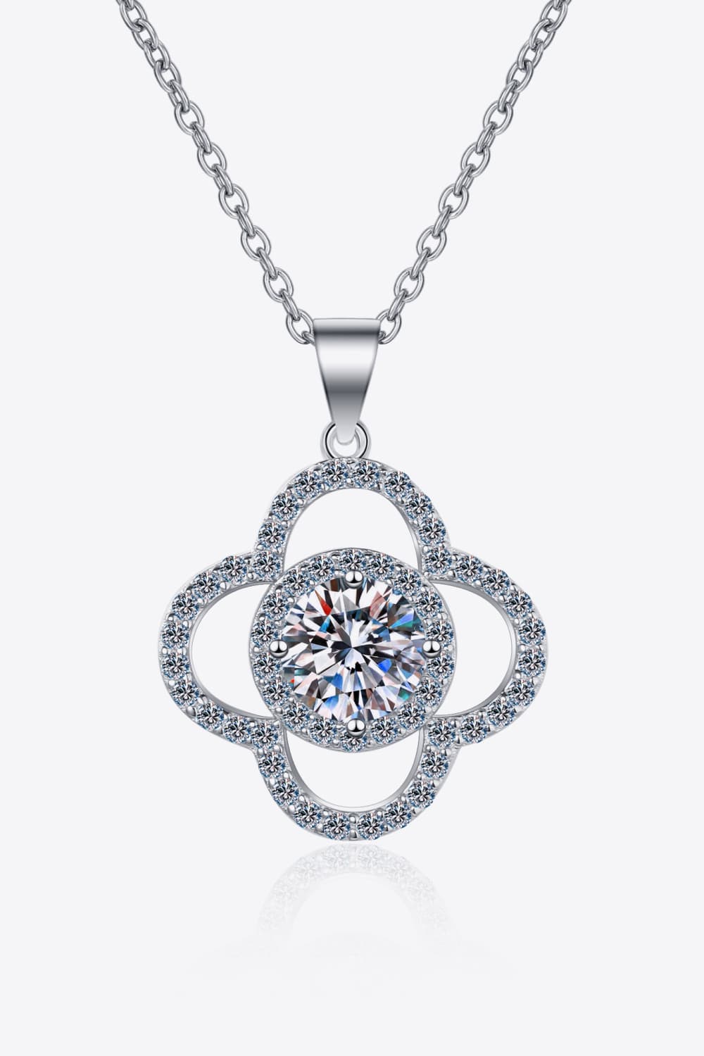 Elegant stainless steel necklace with a sparkling moissanite gemstone centerpiece surrounded by a delicate floral pendant design with intricate crystal accents.