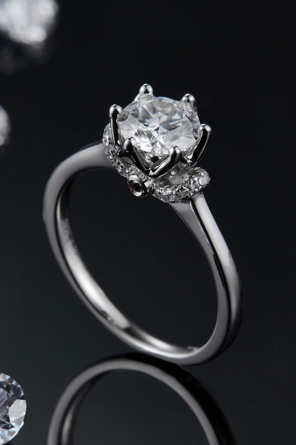 Elegant diamond engagement ring with sparkling center stone set in sleek sterling silver band