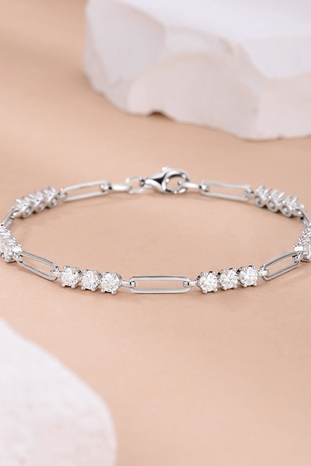 Elegant sterling silver bracelet adorned with sparkling moissanite stones, showcasing a sophisticated and timeless design perfect for any occasion.