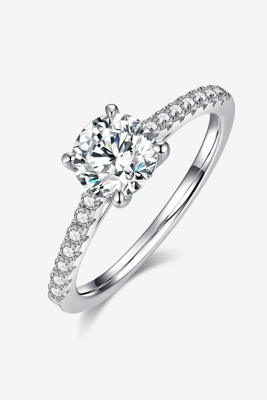 Elegant 1-carat moissanite ring with delicate silver band and sparkling side stones