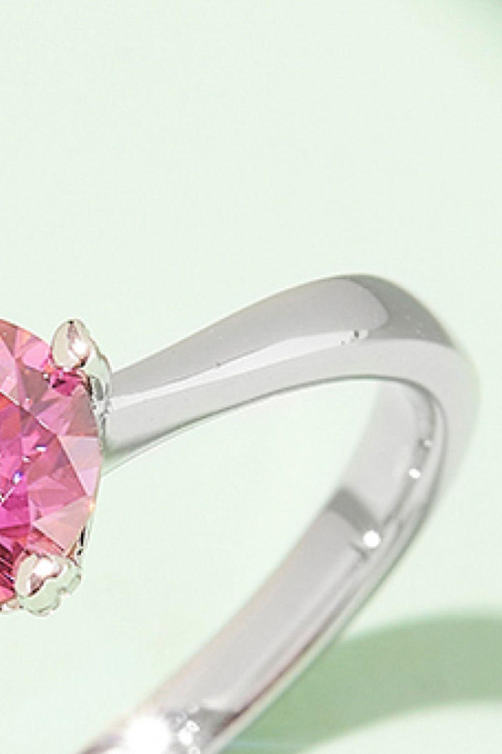 Elegant pink moissanite solitaire ring in sterling silver