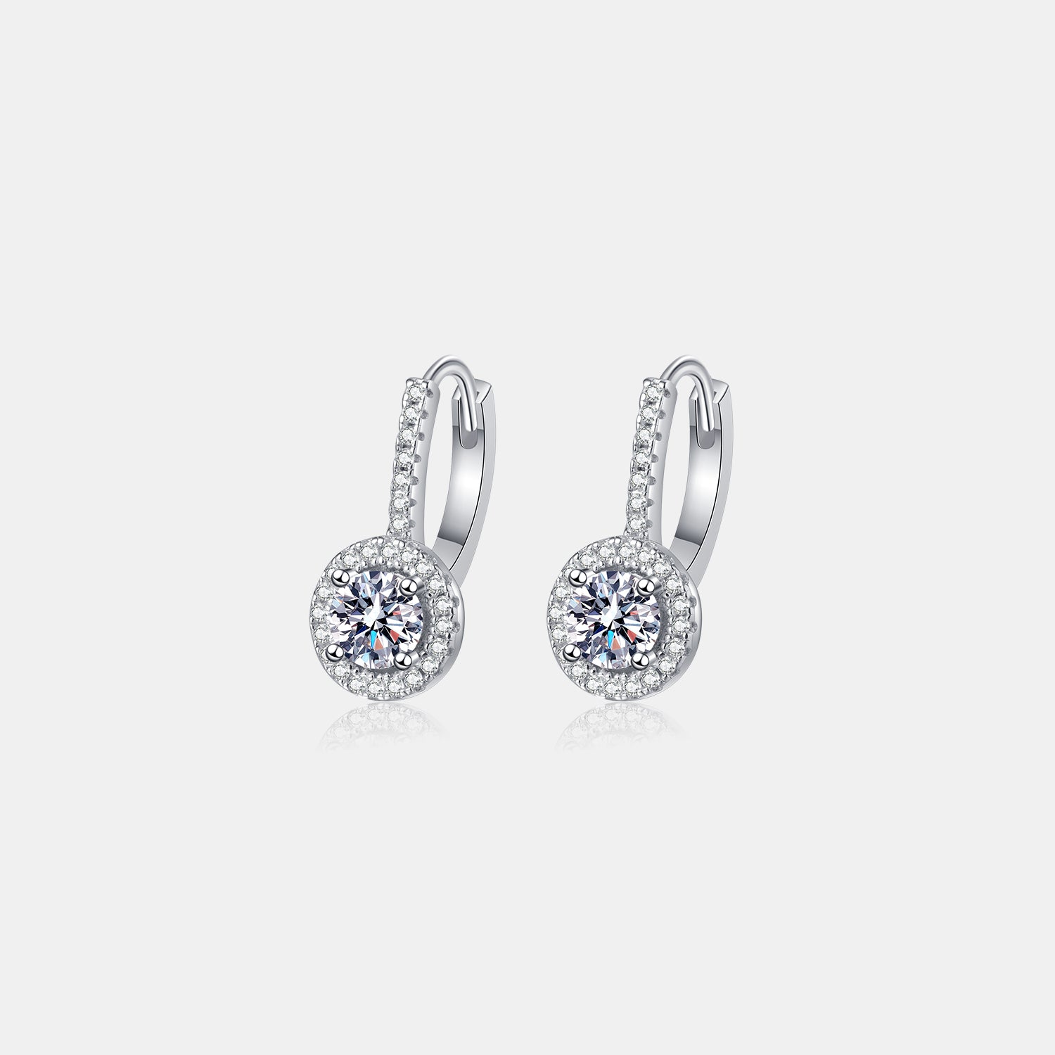 Elegant 1 Carat Moissanite 925 Sterling Silver Earrings featuring a sparkling round center stone surrounded by a halo of smaller gems, set in a sleek silver frame.