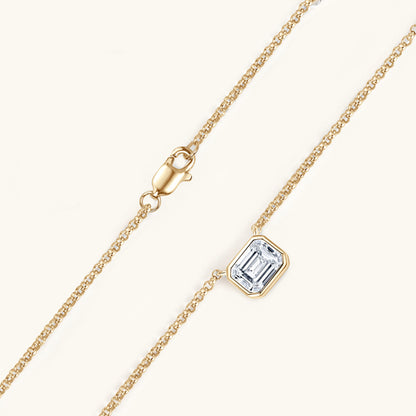 Elegant 1 Carat Moissanite Pendant Necklace - Captivating emerald-cut moissanite gem set in 925 sterling silver with 14K gold-tone chain.