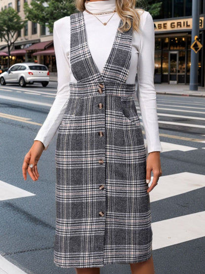 a woman standing on the side of a road