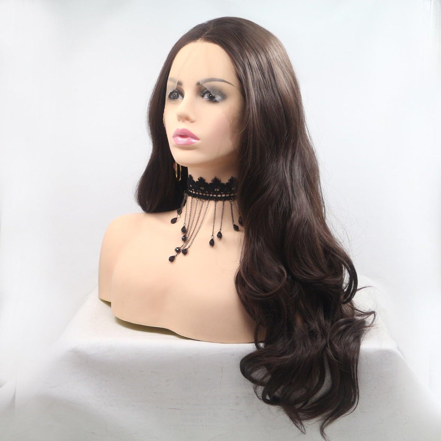 Wavy long dark brown synthetic wig with 130% density on model