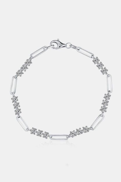 Elegant Moissanite and Sterling Silver Bracelet - Sparkling gemstone accents adorn the sleek chain links of this sophisticated bracelet.